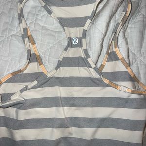 Lulu lemon M size workout tank. Grey stripe. Orange lining.